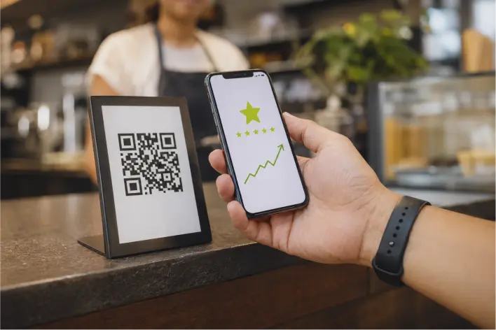 How do reviews affect local SEO, customer scanning QR code to leave a Google review at checkout